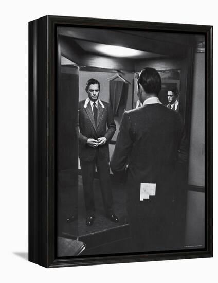 Gregory Peck Trying on Suit for His New Movie Man in the Grey Flannel Suit-Michael Rougier-Framed Premier Image Canvas