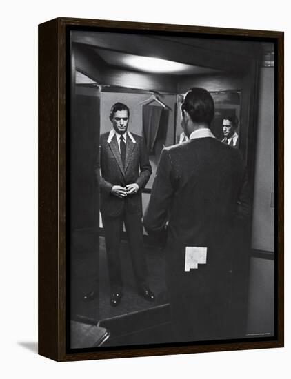 Gregory Peck Trying on Suit for His New Movie Man in the Grey Flannel Suit-Michael Rougier-Framed Premier Image Canvas