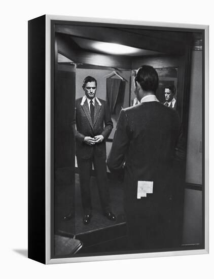 Gregory Peck Trying on Suit for His New Movie Man in the Grey Flannel Suit-Michael Rougier-Framed Premier Image Canvas