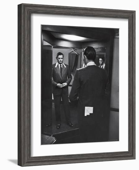 Gregory Peck Trying on Suit for His New Movie Man in the Grey Flannel Suit-Michael Rougier-Framed Premium Photographic Print