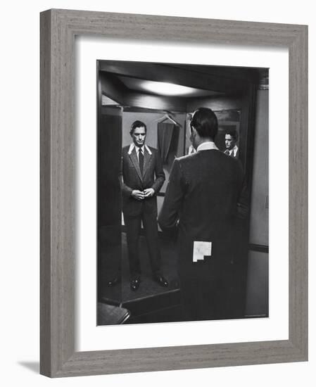 Gregory Peck Trying on Suit for His New Movie Man in the Grey Flannel Suit-Michael Rougier-Framed Premium Photographic Print