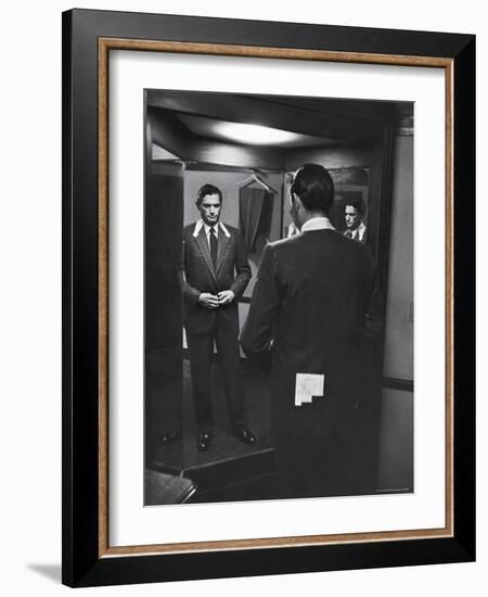 Gregory Peck Trying on Suit for His New Movie Man in the Grey Flannel Suit-Michael Rougier-Framed Premium Photographic Print