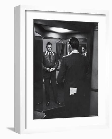 Gregory Peck Trying on Suit for His New Movie Man in the Grey Flannel Suit-Michael Rougier-Framed Premium Photographic Print