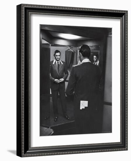 Gregory Peck Trying on Suit for His New Movie Man in the Grey Flannel Suit-Michael Rougier-Framed Premium Photographic Print