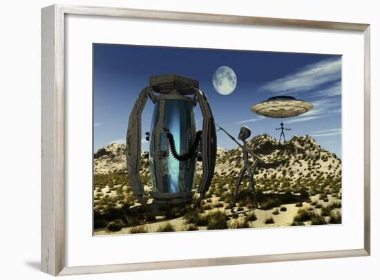 Grey Aliens Tending to a Storage Container Used to Transport Specimens-Stocktrek Images-Framed Art Print