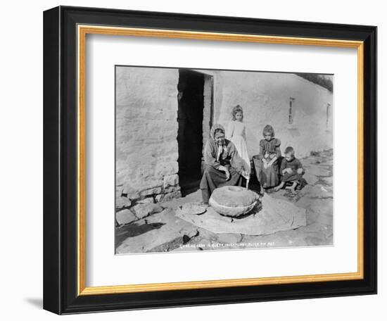 Grinding Grain in a Quern, Inishmurray, County Sligo, 1900-Robert John Welch-Framed Giclee Print