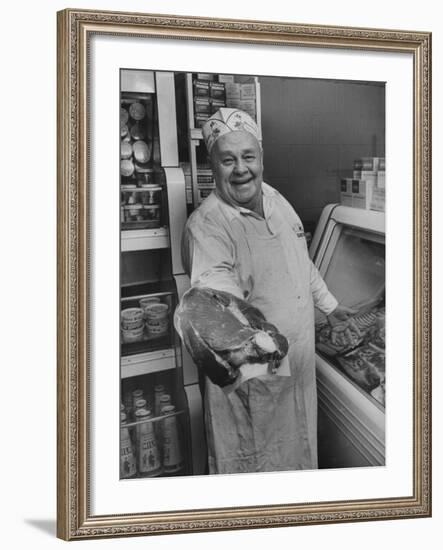 Grocer E.G. Guthart Displaying One of His Steaks-Francis Miller-Framed Photographic Print