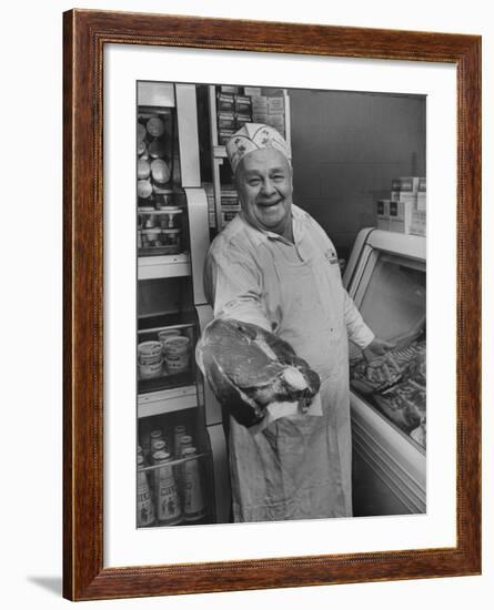 Grocer E.G. Guthart Displaying One of His Steaks-Francis Miller-Framed Photographic Print