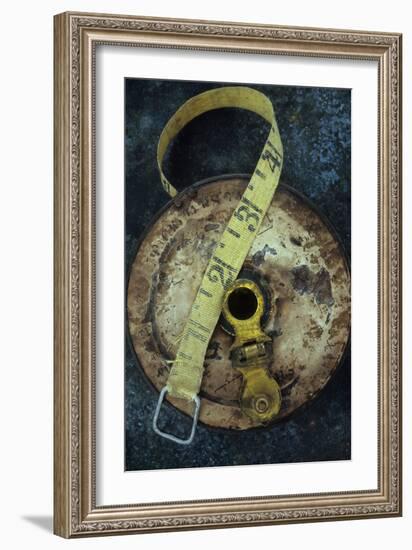Groundsmans Measuring Tape in Well Worn Metal Case with Brass Winding Handle Lying-Den Reader-Framed Photographic Print