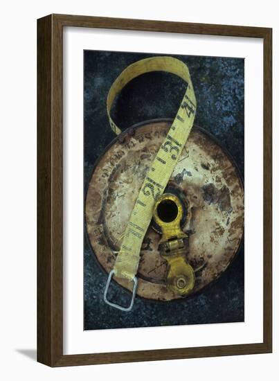 Groundsmans Measuring Tape in Well Worn Metal Case with Brass Winding Handle Lying-Den Reader-Framed Photographic Print