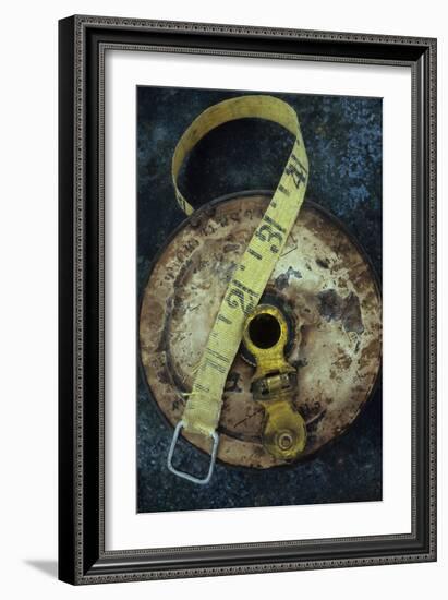 Groundsmans Measuring Tape in Well Worn Metal Case with Brass Winding Handle Lying-Den Reader-Framed Photographic Print