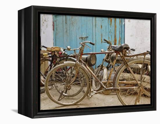 Group of bicycles in gulley (alley) Delhi, India-Adam Jones-Framed Premier Image Canvas