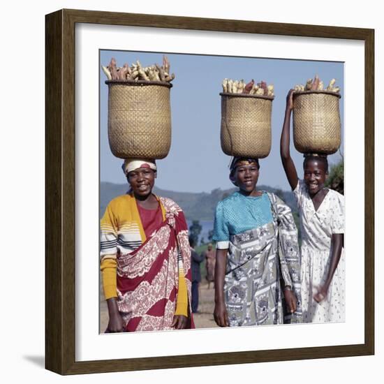 Group of Cheerful Women Carry Sweet Potatoes to Market in Traditional Split-Bamboo Baskets-Nigel Pavitt-Framed Photographic Print