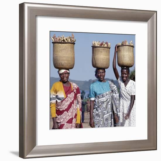 Group of Cheerful Women Carry Sweet Potatoes to Market in Traditional Split-Bamboo Baskets-Nigel Pavitt-Framed Photographic Print