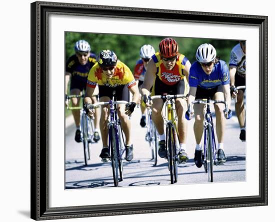 Group of Cyclists Riding Bicycles-null-Framed Photographic Print