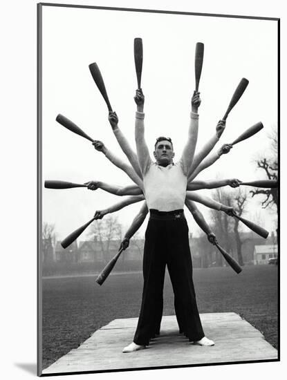 Group of Men Exercising, Making Star Formation with Arms (B&W)-Hulton Archive-Mounted Photographic Print