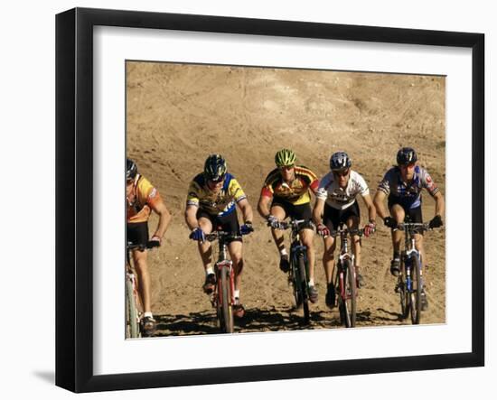 Group of People Riding Bicycles in a Race-null-Framed Photographic Print