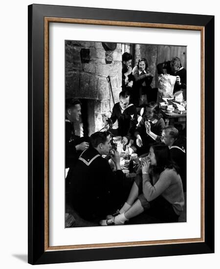 Group of Sailors and Young Ladies Sitting around a Fire Roasting Hot Dogs and Drinking Coke-Nina Leen-Framed Photographic Print