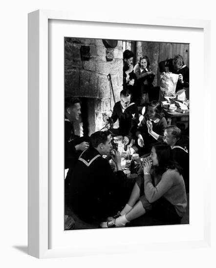 Group of Sailors and Young Ladies Sitting around a Fire Roasting Hot Dogs and Drinking Coke-Nina Leen-Framed Photographic Print