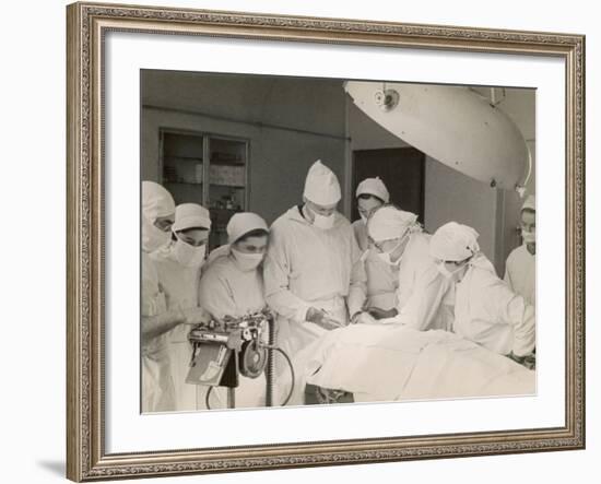 Group of Student Nurses in Theatre Observing a Surgeon Performing an Operation-null-Framed Photographic Print