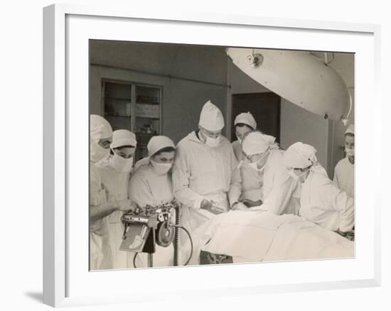Group of Student Nurses in Theatre Observing a Surgeon Performing an Operation-null-Framed Photographic Print