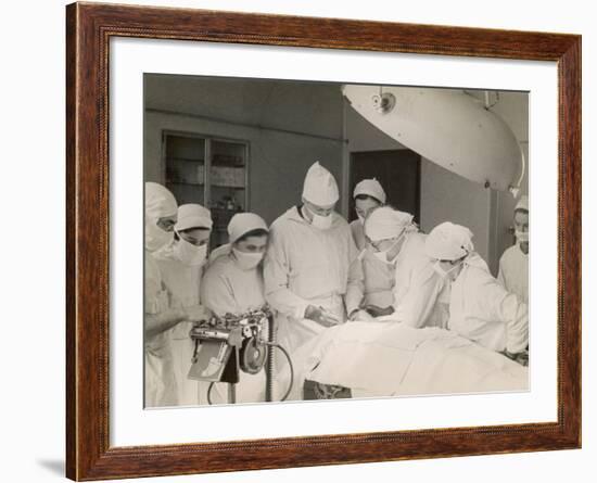 Group of Student Nurses in Theatre Observing a Surgeon Performing an Operation-null-Framed Photographic Print