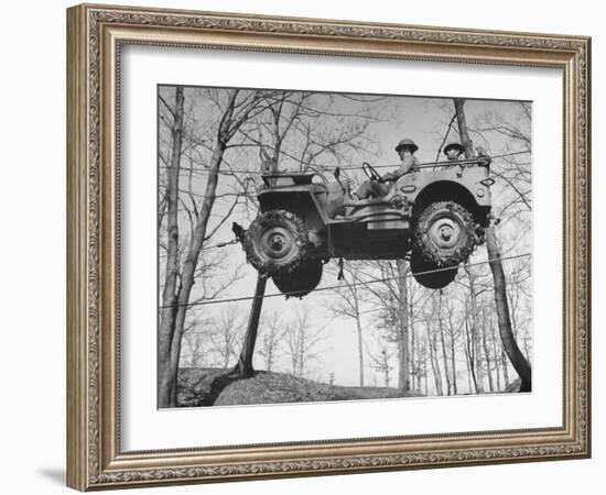 Group of Us Soldiers Pulling a Jeep over a Ravine Using Ropes while on Maneuvers-William C^ Shrout-Framed Photographic Print