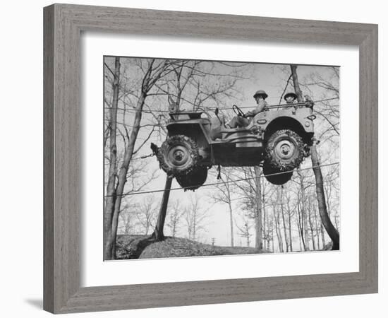 Group of Us Soldiers Pulling a Jeep over a Ravine Using Ropes while on Maneuvers-William C^ Shrout-Framed Photographic Print