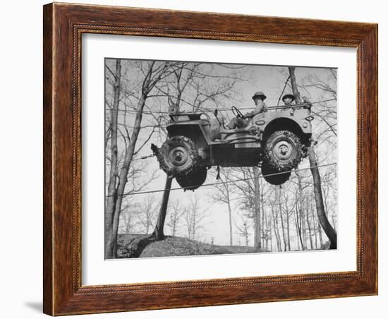 Group of Us Soldiers Pulling a Jeep over a Ravine Using Ropes while on Maneuvers-William C^ Shrout-Framed Photographic Print