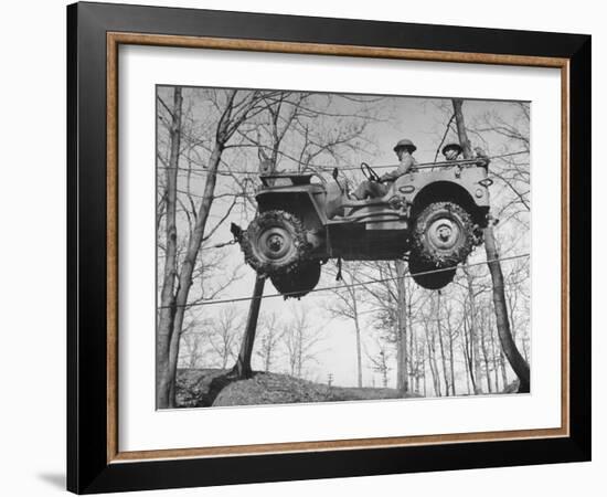 Group of Us Soldiers Pulling a Jeep over a Ravine Using Ropes while on Maneuvers-William C^ Shrout-Framed Photographic Print