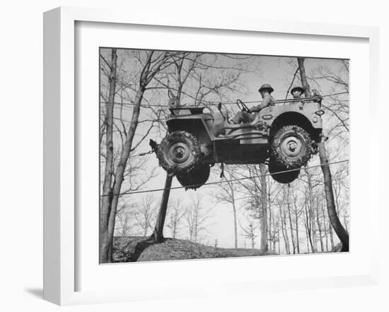 Group of Us Soldiers Pulling a Jeep over a Ravine Using Ropes while on Maneuvers-William C^ Shrout-Framed Photographic Print