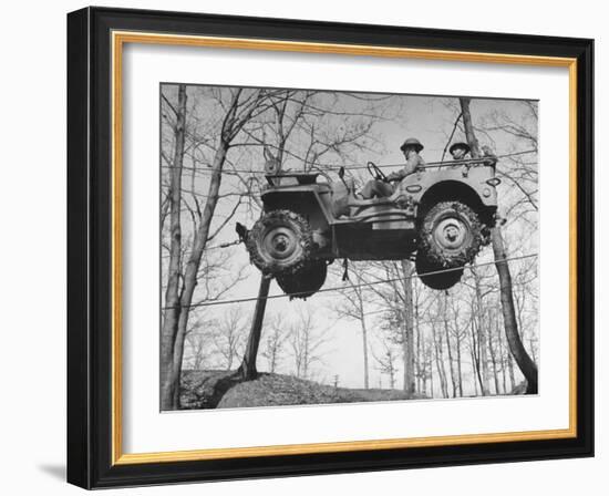 Group of Us Soldiers Pulling a Jeep over a Ravine Using Ropes while on Maneuvers-William C^ Shrout-Framed Photographic Print