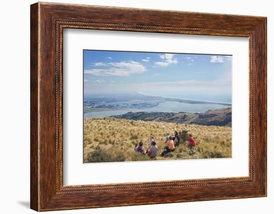 Group of young people enjoying a picnic on the Port Hills, Christchurch, Canterbury, South Island, -Ruth Tomlinson-Framed Photographic Print