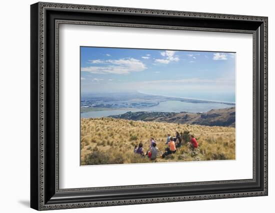 Group of young people enjoying a picnic on the Port Hills, Christchurch, Canterbury, South Island, -Ruth Tomlinson-Framed Photographic Print