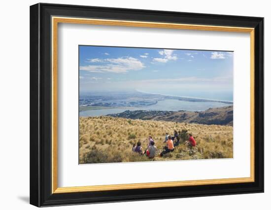 Group of young people enjoying a picnic on the Port Hills, Christchurch, Canterbury, South Island, -Ruth Tomlinson-Framed Photographic Print