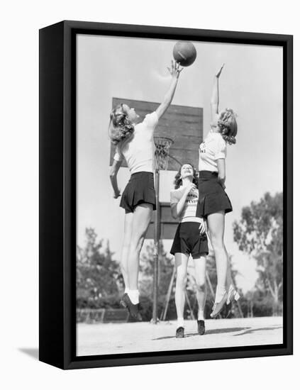 Group of Young Woman Playing Basketball-null-Framed Stretched Canvas