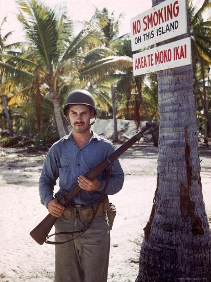 Guard on Duty Beneath a No Smoking Sign on Tarawa During WWII-J^ R^ Eyerman-Photographic Print