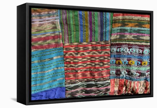 Guatemala. Typical Guatemalan textile; fabric scraps of various colors and textures forming a quilt-Kymri Wilt-Framed Premier Image Canvas