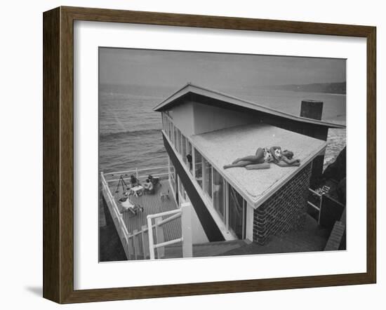 Guests Playing Cards and Sunbathing at Cliffside Home of W. M. MacConnell-Peter Stackpole-Framed Photographic Print