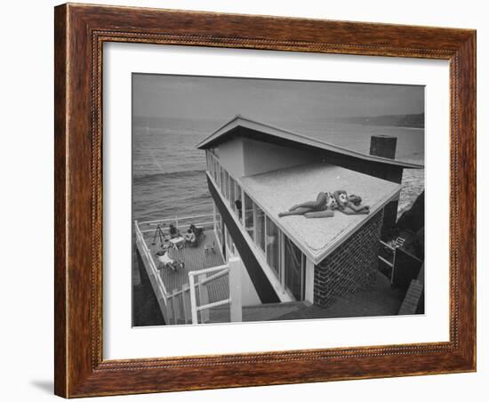 Guests Playing Cards and Sunbathing at Cliffside Home of W. M. MacConnell-Peter Stackpole-Framed Photographic Print