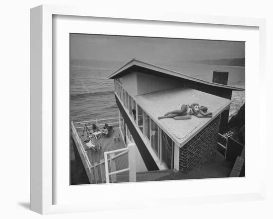 Guests Playing Cards and Sunbathing at Cliffside Home of W. M. MacConnell-Peter Stackpole-Framed Photographic Print