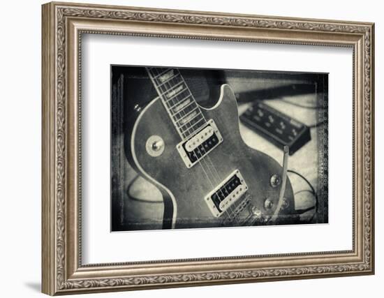 Guitar with Loudspeaker Boxes in the Background, Selective Focus, Polaroid Style-Bernd Wittelsbach-Framed Photographic Print