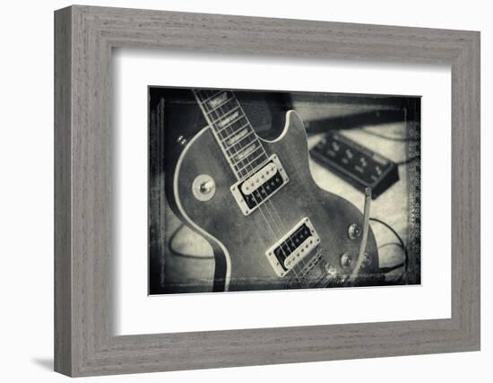 Guitar with Loudspeaker Boxes in the Background, Selective Focus, Polaroid Style-Bernd Wittelsbach-Framed Photographic Print