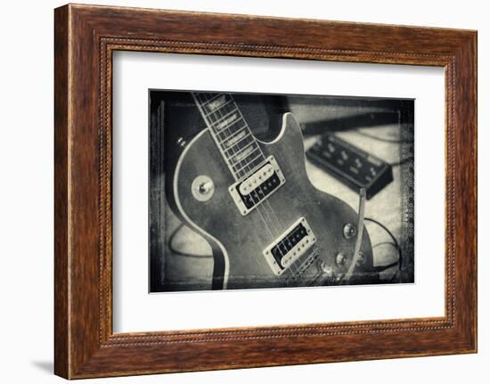 Guitar with Loudspeaker Boxes in the Background, Selective Focus, Polaroid Style-Bernd Wittelsbach-Framed Photographic Print