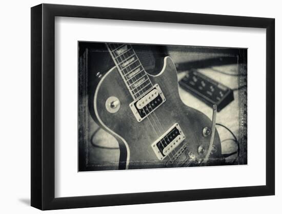 Guitar with Loudspeaker Boxes in the Background, Selective Focus, Polaroid Style-Bernd Wittelsbach-Framed Photographic Print