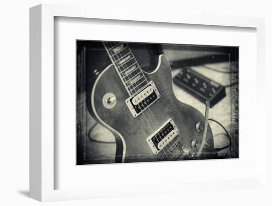 Guitar with Loudspeaker Boxes in the Background, Selective Focus, Polaroid Style-Bernd Wittelsbach-Framed Photographic Print