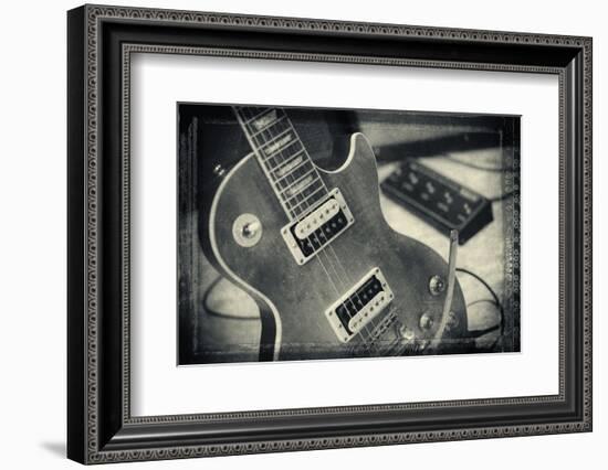 Guitar with Loudspeaker Boxes in the Background, Selective Focus, Polaroid Style-Bernd Wittelsbach-Framed Photographic Print