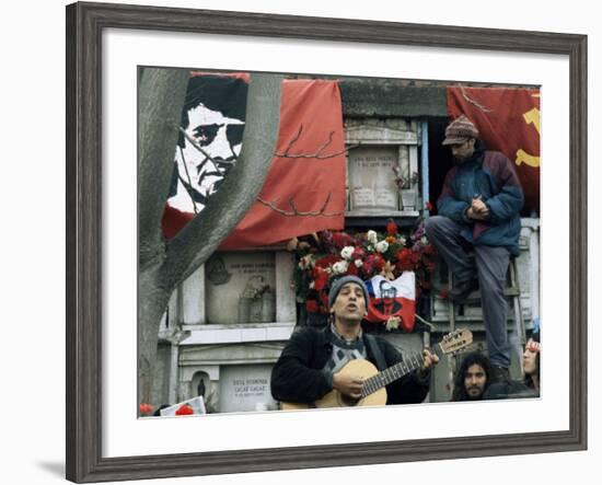 Guitarist Plays Victor Jara Songs at His Grave on 11th De Septiembre, Chile, South America-Aaron McCoy-Framed Photographic Print