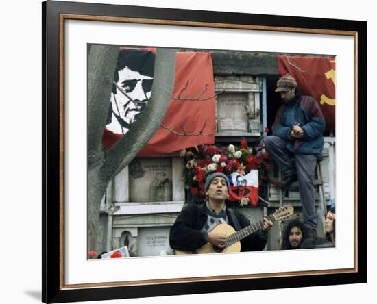 Guitarist Plays Victor Jara Songs at His Grave on 11th De Septiembre, Chile, South America-Aaron McCoy-Framed Photographic Print