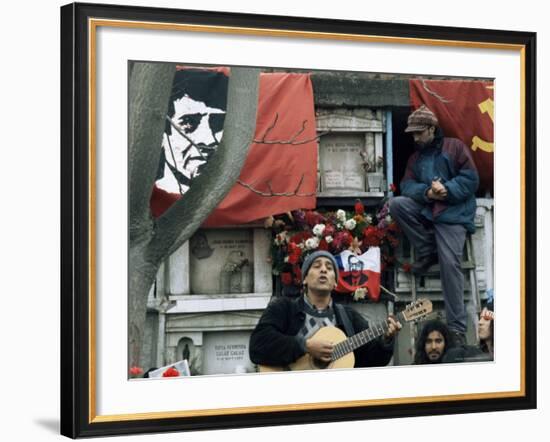 Guitarist Plays Victor Jara Songs at His Grave on 11th De Septiembre, Chile, South America-Aaron McCoy-Framed Photographic Print